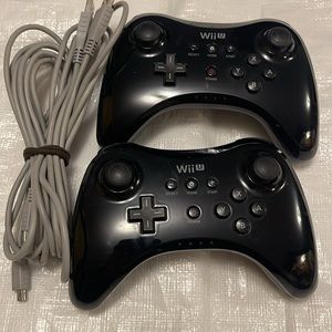 Wii U pro controllers x 2